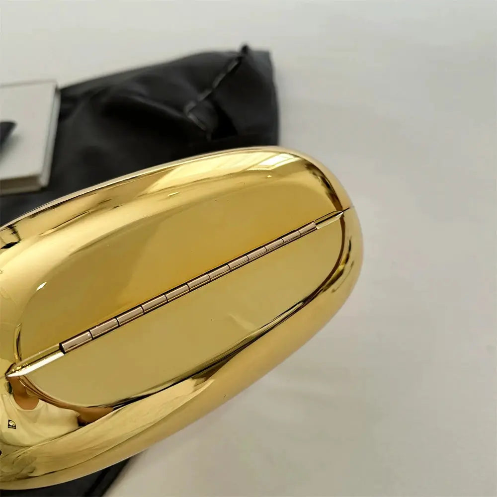 MOODS golden PVC round-handle evening clutch bag for women by Simples Market