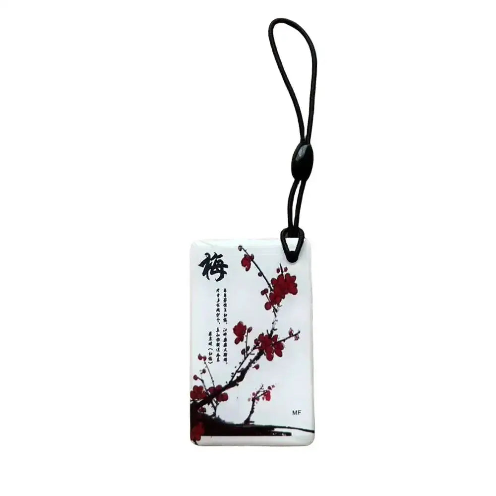 Simples Market RFID key tag with red blossom artwork and black lanyard