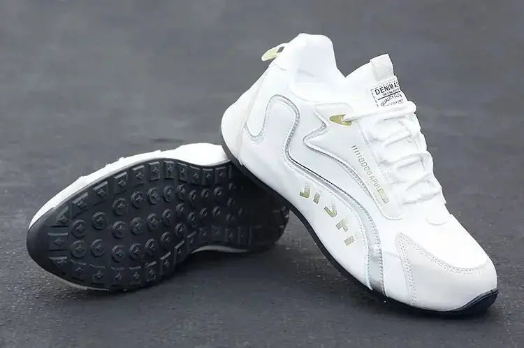 Pair of white Simples Market PU leather waterproof sneakers with gold accents and black outsole