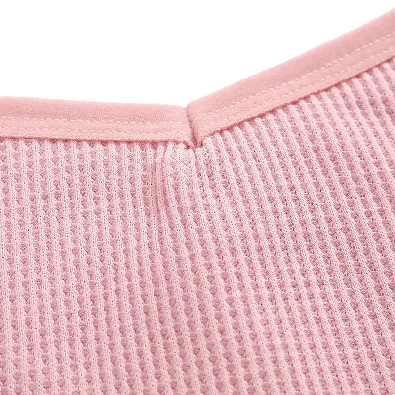 Pink waffle-knit cotton panties close-up with ribbed fabric and V-waist seam (4-piece set)