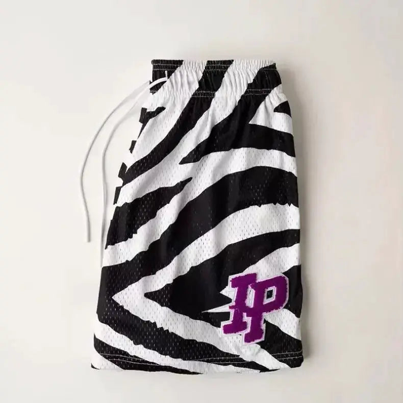 Men's zebra-print mesh shorts with white drawstring, quick-dry fabric, purple RP logo.
