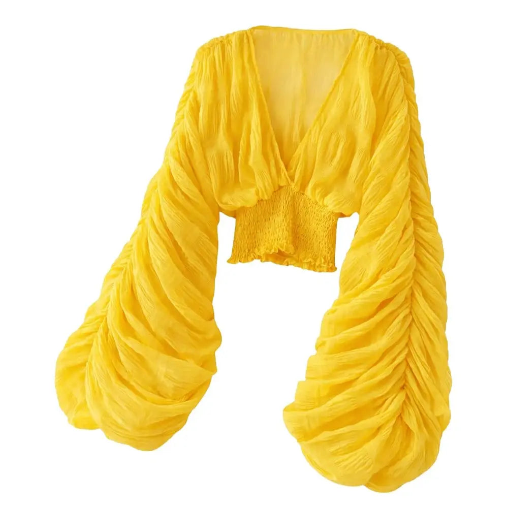 Yellow draped chiffon blouse with V-neck, puff long sleeves and smocked waist by Simples Market
