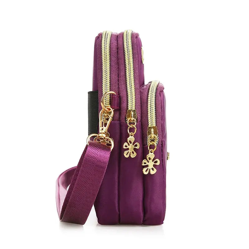 Mobile phone bag, purple women's crossbody mini bag with gold zippers and flower charms
