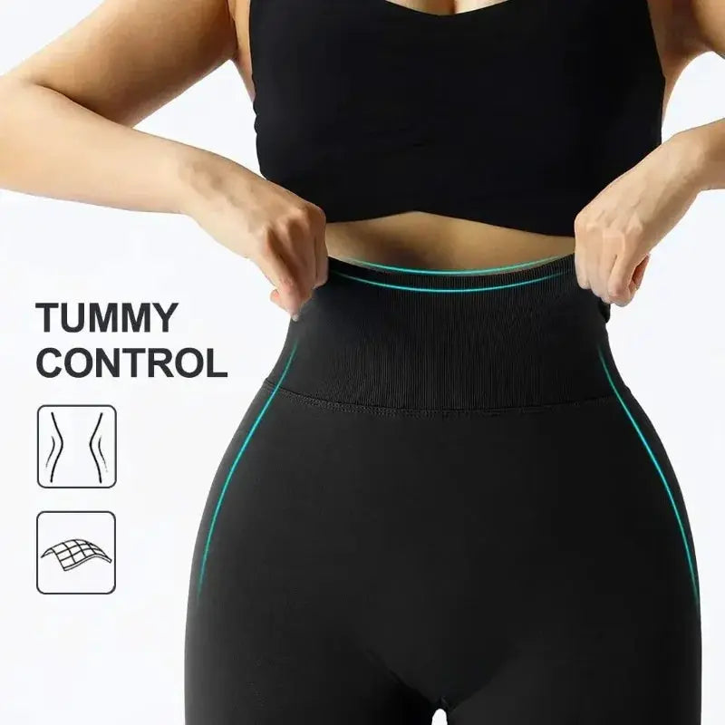 Seamless knitted leggings for women, high-waist black with teal side piping, tummy control.