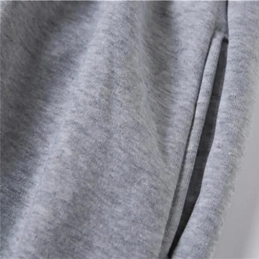 Mens grey fleece jogger pants with side pocket seam detail