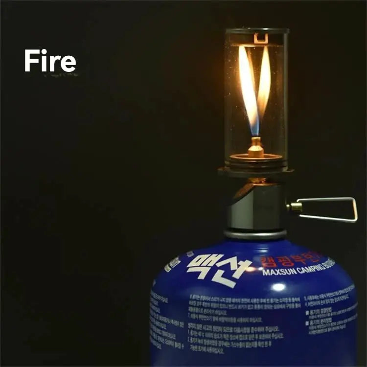 BRS-55 Dreamlike Candlelight Lamp on blue Maxsun camping gas canister with glass lantern