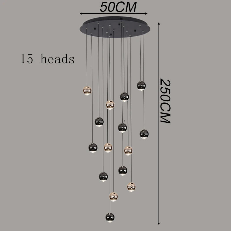 Modern pendant light with 15 hanging orb LED lamps in black and rose-gold finishes