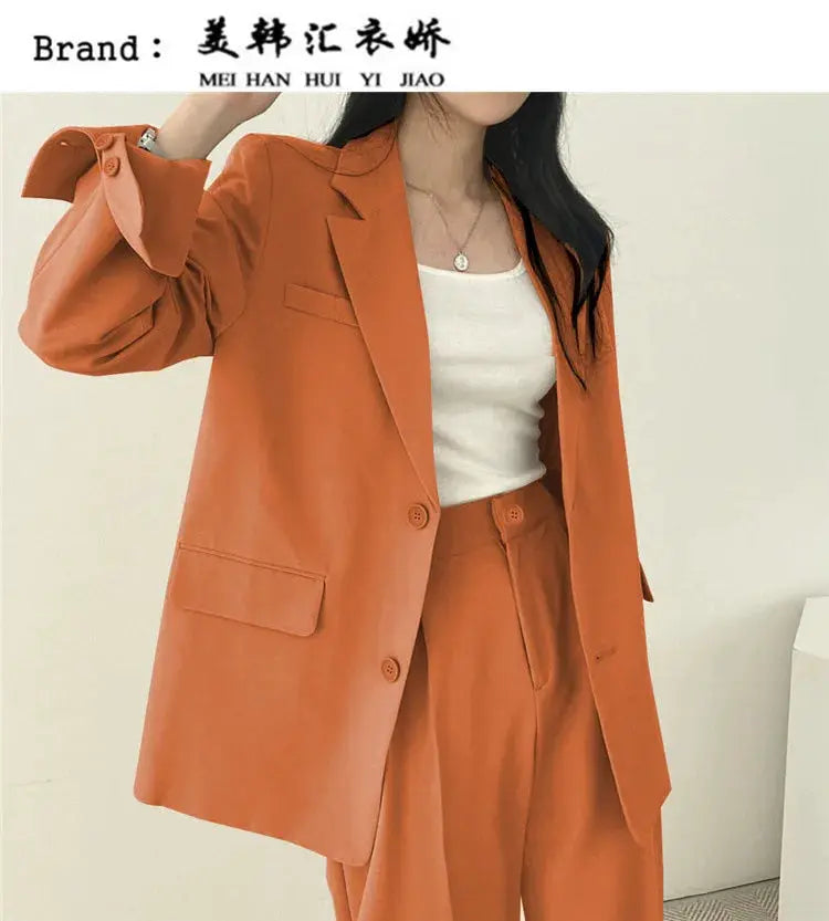 Women's burnt-orange long-sleeve blazer with matching pants two-piece outfit by Simples Market