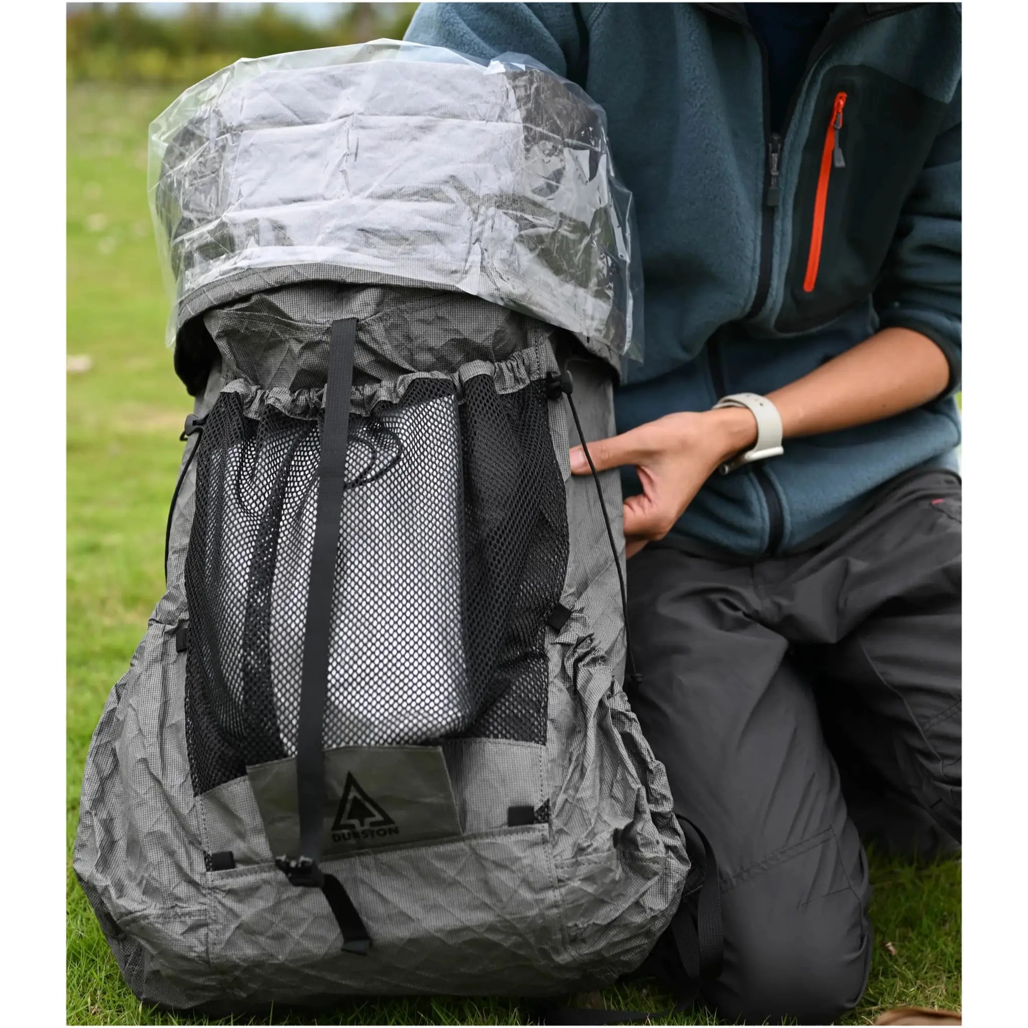 Backpack liner dry bag; ultralight polycro inner bag inside a gray hiking backpack
