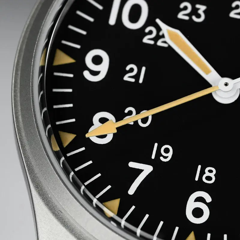 Militado ML07 quartz military watch with black dial, white numerals, and gold-tone hands under sapphire crystal
