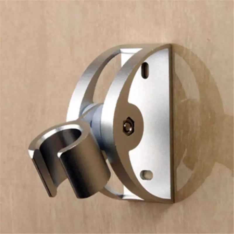 Hand shower holder in silver metal with suction mount and rotatable bracket