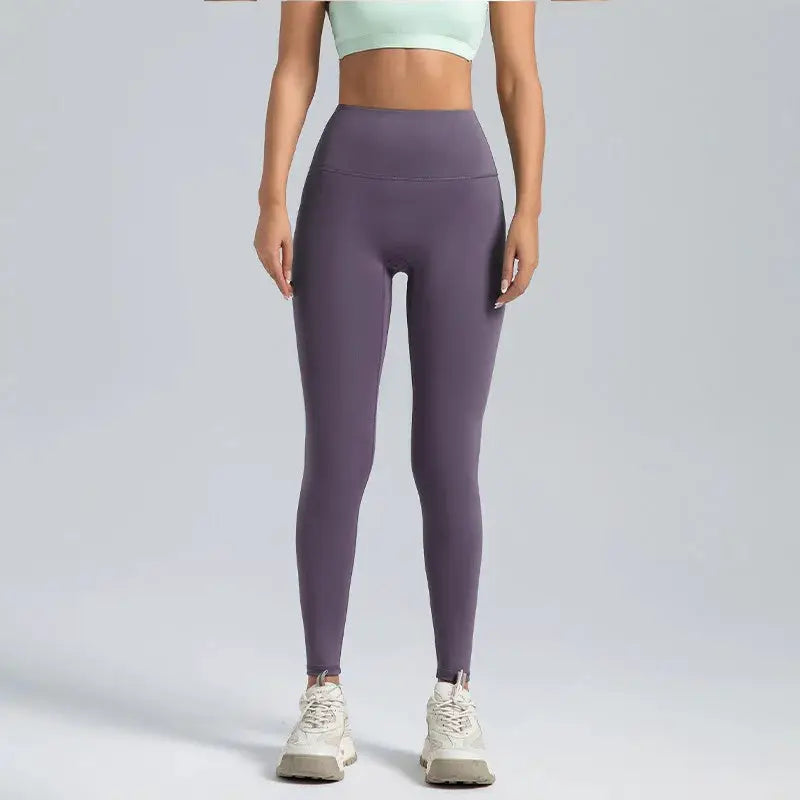 Purple high-waisted women's yoga leggings with ankle zippers