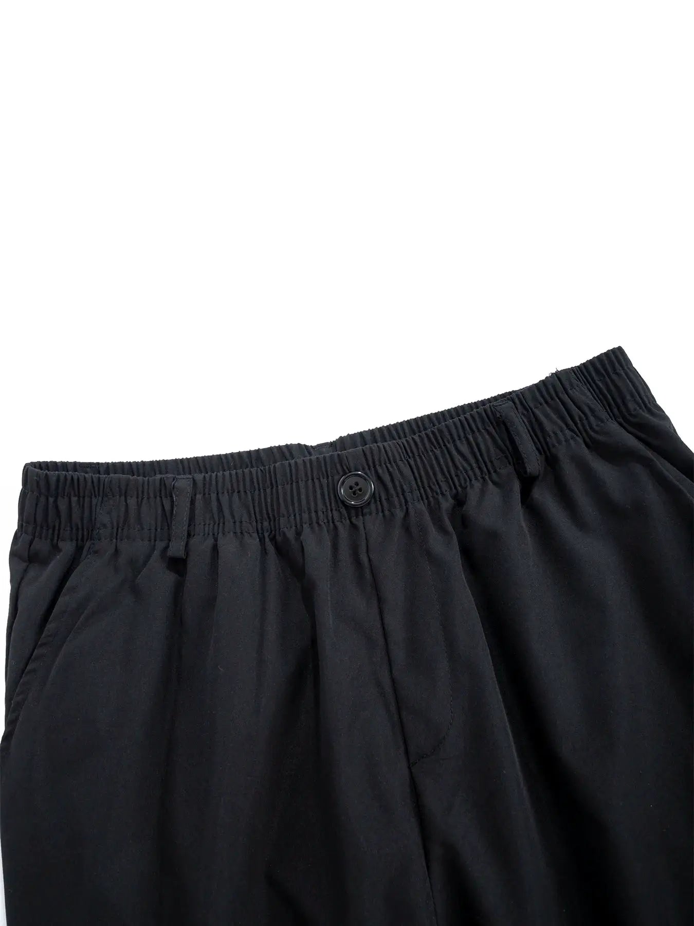 Men's black casual pants with elastic waistband and single button closure