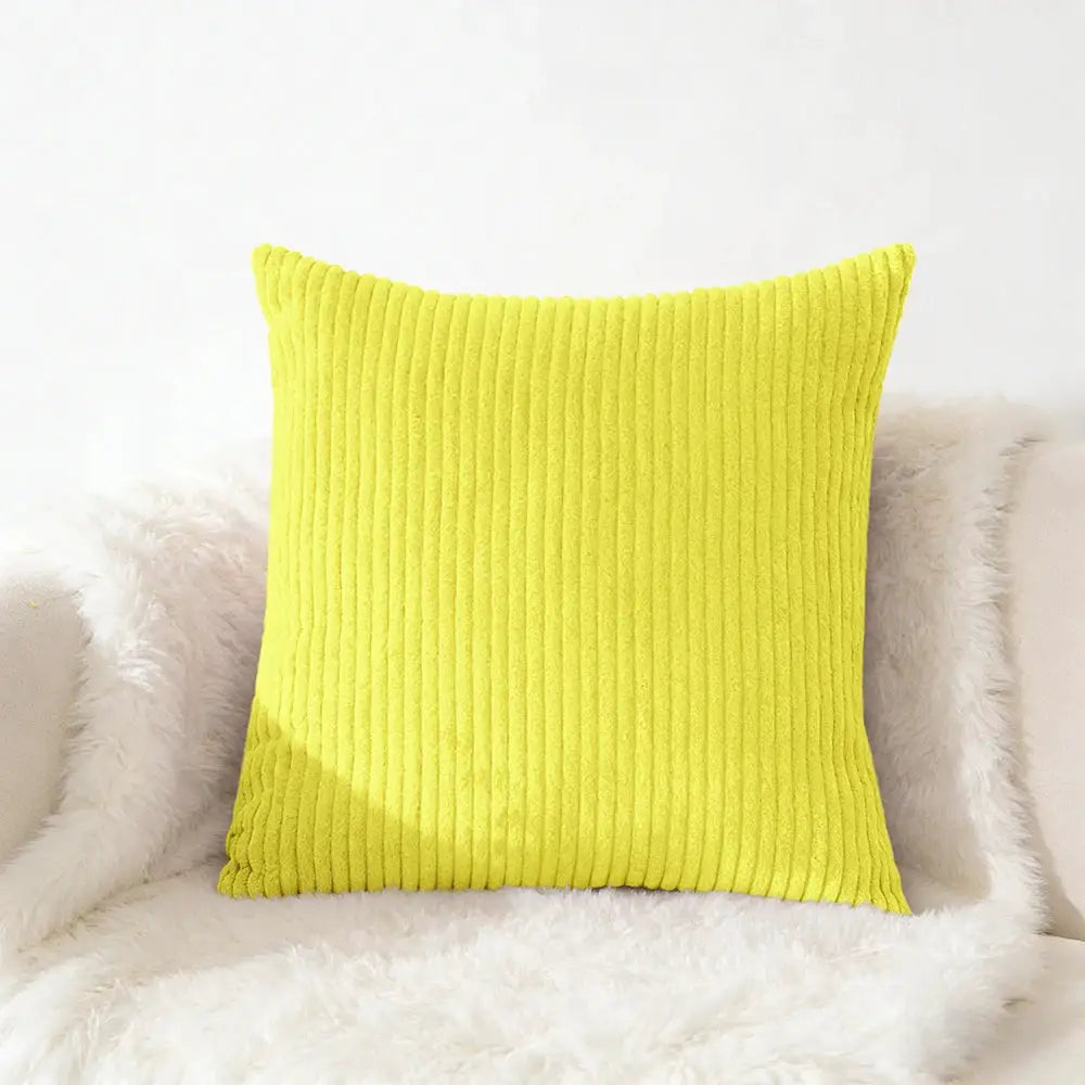 Corduroy pillow cover by Simples Market; bright yellow square cushion for sofa.
