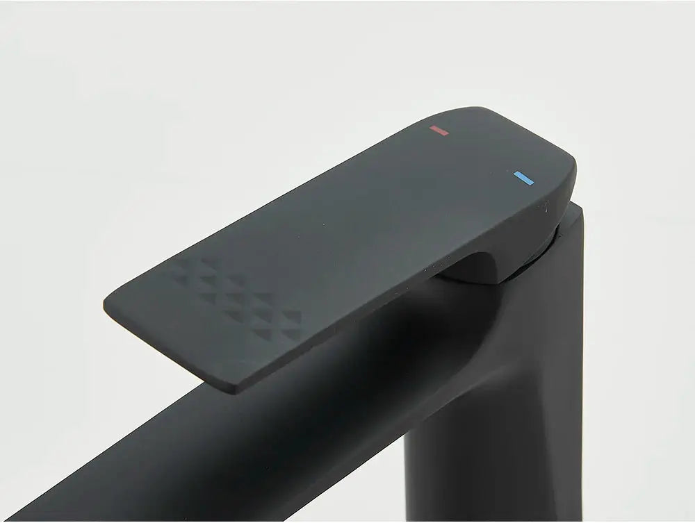 Black deck-mounted bathroom sink mixer faucet with single lever; matte black finish by Simples Market.