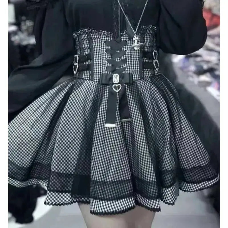 Sweet Lolita style black top with white gingham panels, lace-up corset belt and puff sleeves