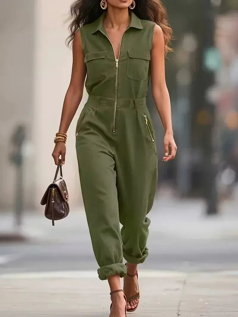 Olive green women's sleeveless jumpsuit with zip-front, turn-down collar, chest pockets, and cuffed ankles