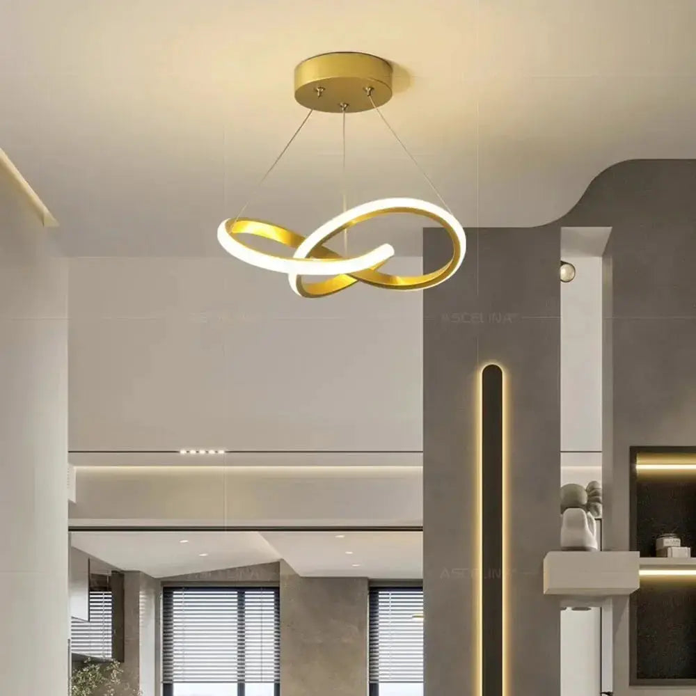 Nordic LED ceiling pendant lamp by Simples Market with gold-white intertwined rings