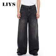 Men's wide-leg black denim jeans, loose baggy fit, dark washed; LIYS logo visible.