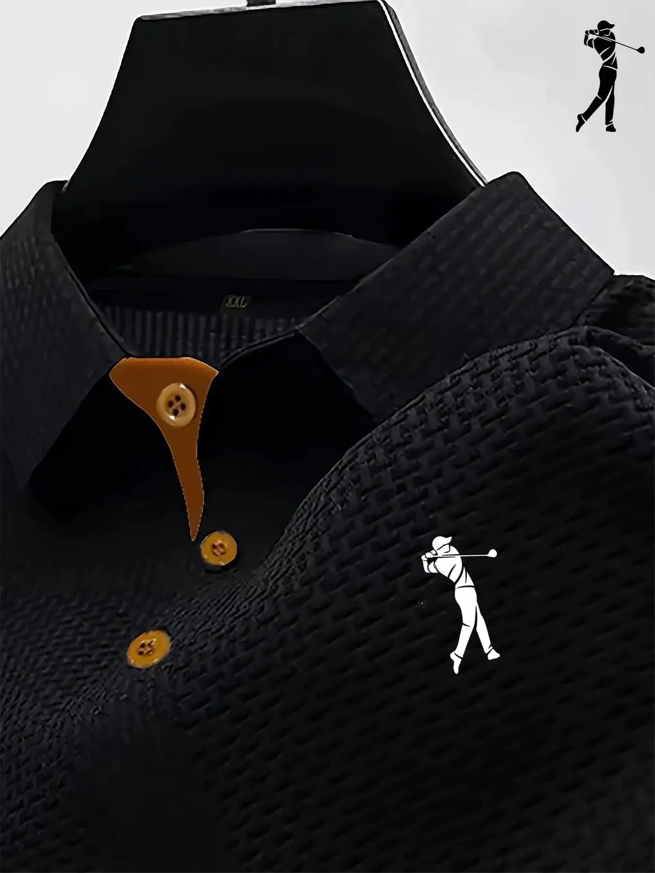 Black men's polo shirt with orange placket and buttons; textured knit, short sleeves