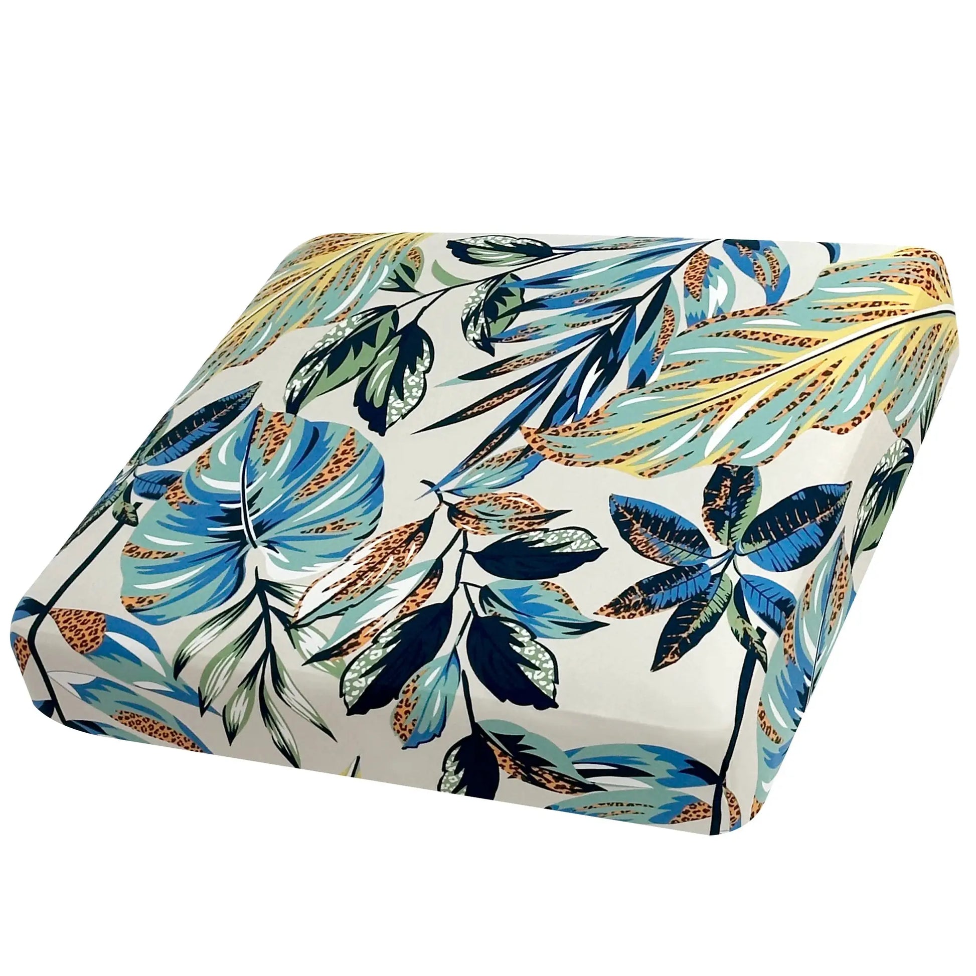 Milk silk elastic sofa cover by Simples Market with tropical leaf print in blue and green.