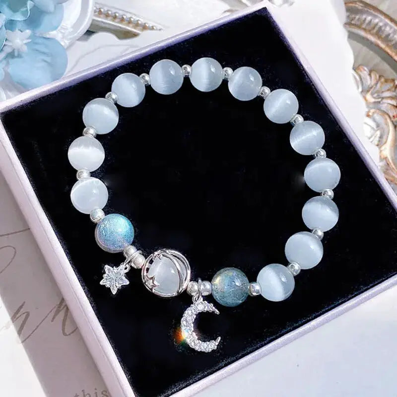 Blue opal stone bracelet for women with moon and star charms and crystal accents, 18.6cm, Simples Market