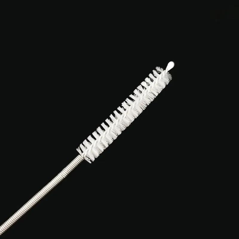 Long flexible refrigerator drain dredge brush with stainless steel shaft and white bristles