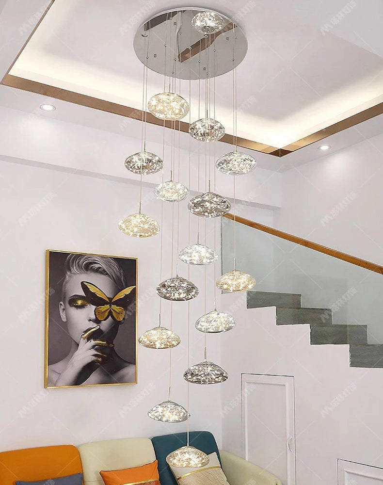 Pendant lights by Simples Market: 12 crystal glass disc pendants hanging from a circular ceiling mount in living room.