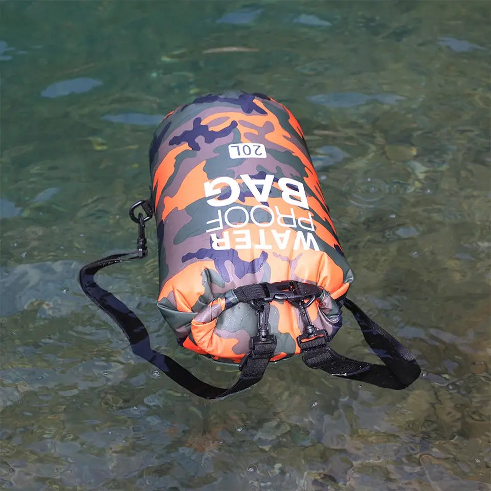 Dry bag waterproof camouflage orange/green with roll-top closure and black straps