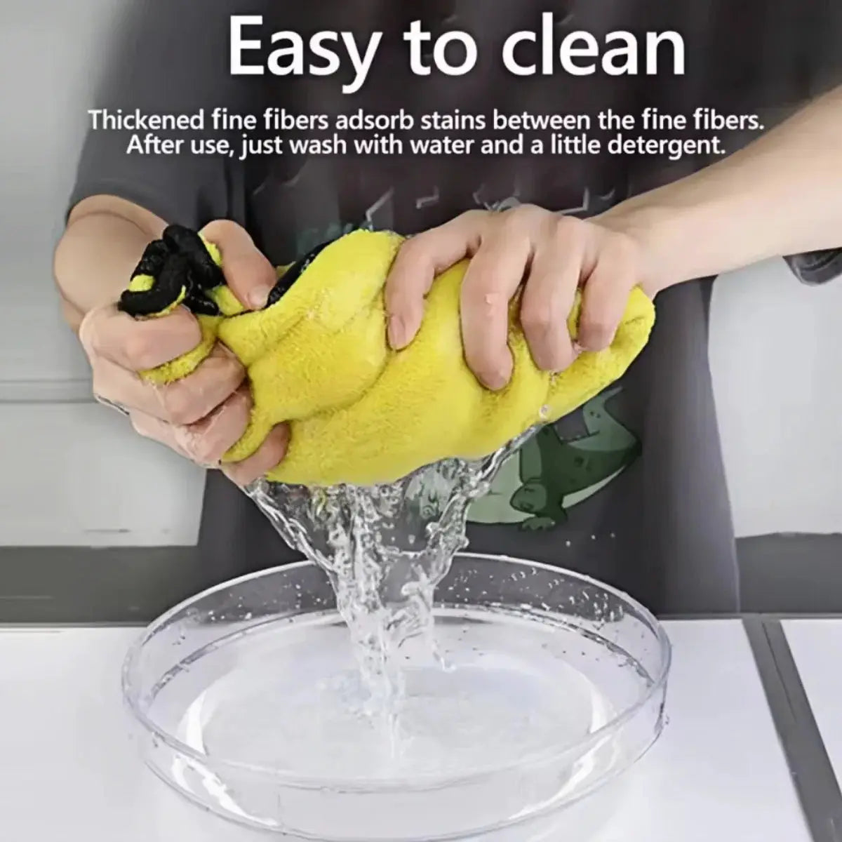Simples Market yellow car microfiber towel (coral fleece) being wrung under running water