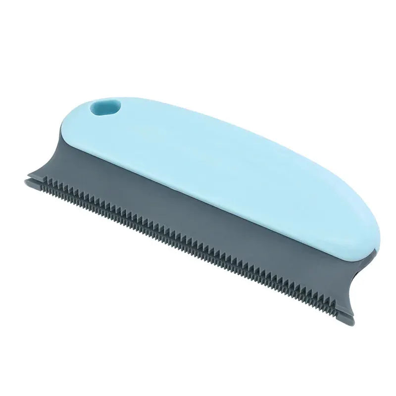Lint remover brush with blue top and gray base, portable fabric and pet hair remover for sofas