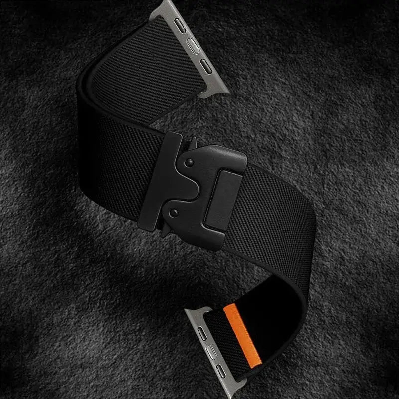 Braided elastic nylon Apple Watch Ultra 2 strap by Simples Market, black with orange inner stripe and metal adapters