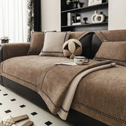 Vintage-style chenille sofa slipcover on a brown sectional, non-slip and pet-friendly for all seasons