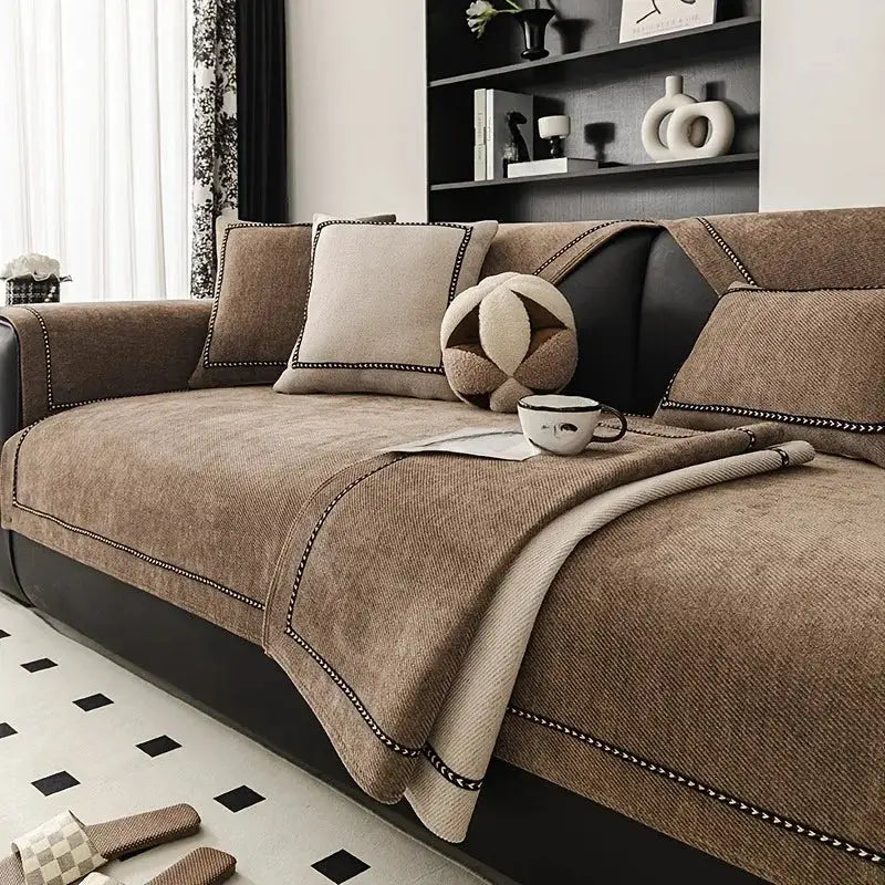 Vintage-style chenille sofa slipcover on a brown sectional, non-slip and pet-friendly for all seasons