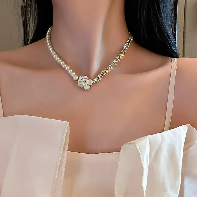 Simples Market pearl and crystal choker necklace with a white flower centerpiece; two-tone gold-tone pearl bead strands
