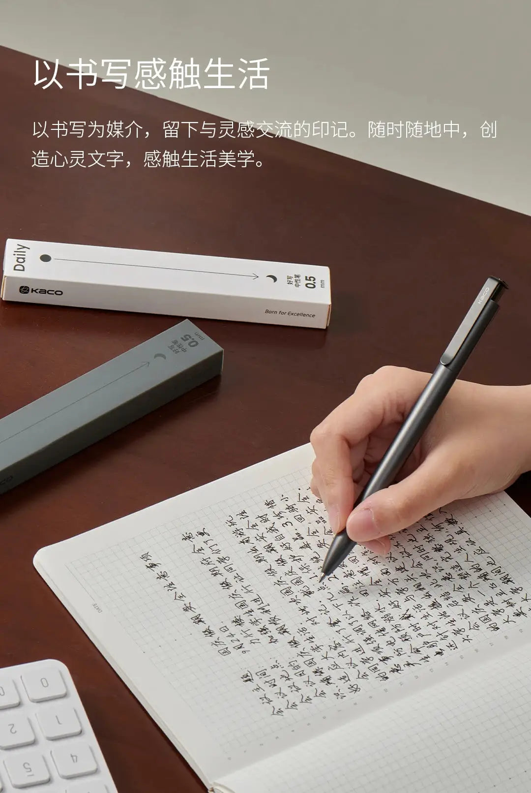 KACO gel pen in hand; black metal clip pen with 0.5mm quick-drying ink. Two KACO boxes visible.