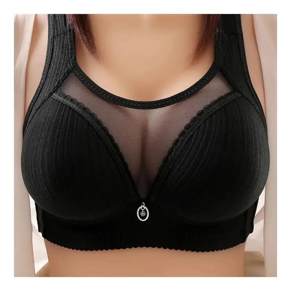 Women's wireless push-up bra by Simples Market in black, with wide straps and sheer mesh chest panel.