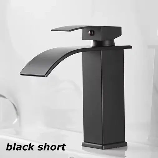 Waterfall wash basin faucet in black finish with tall square body and curved spout.