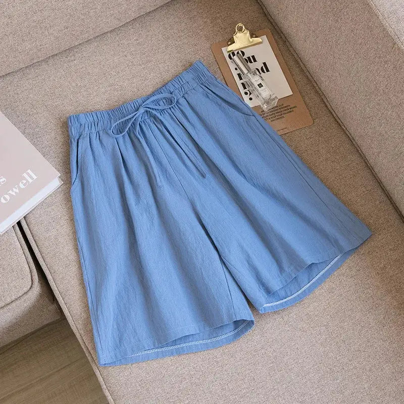 Women’s cotton shorts, light blue, high-waist loose fit with drawstring and two pockets