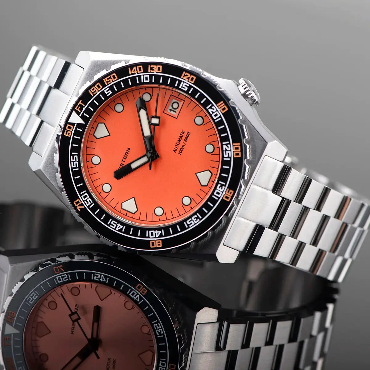 Seestern Sub600T V3 men’s diving watch with orange dial, date window, stainless steel bracelet, ceramic bezel.