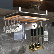 Stainless steel hanging kitchen storage rack with hooks, paper towel holder and utensil rail