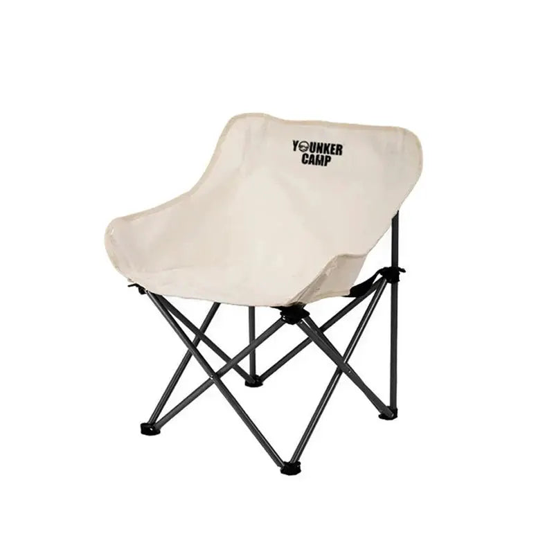 Outdoor folding moon chair with beige fabric and black metal frame, featuring YOUNKER CAMP logo