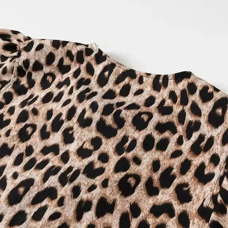 Leopard print crop top with puff sleeves in tan and black spots
