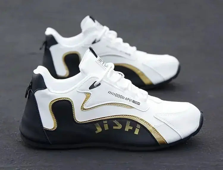 Pair of men's white PU leather waterproof sneakers with black heel and gold trim.
