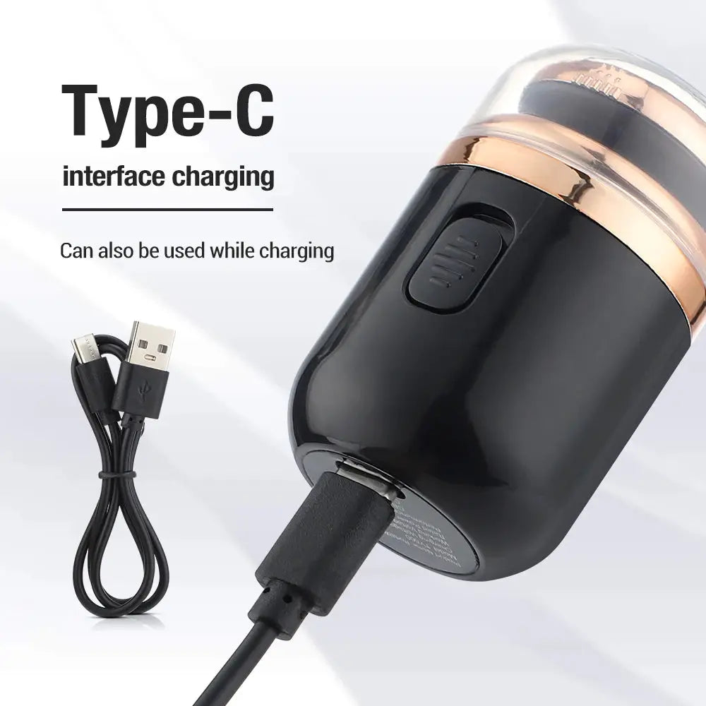 Simples Market mini USB-C travel razor, black capsule-style electric shaver with rose-gold ring and charging cable