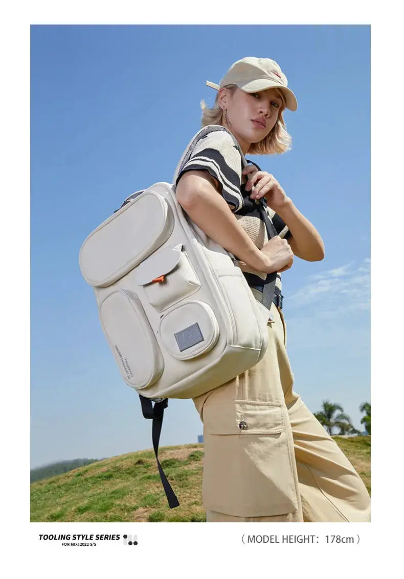 Mixi 18-inch waterproof outdoor backpack white with multiple front pockets