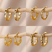 Gold-tone stainless steel hoop earrings set of 4 with textured and chain-link designs