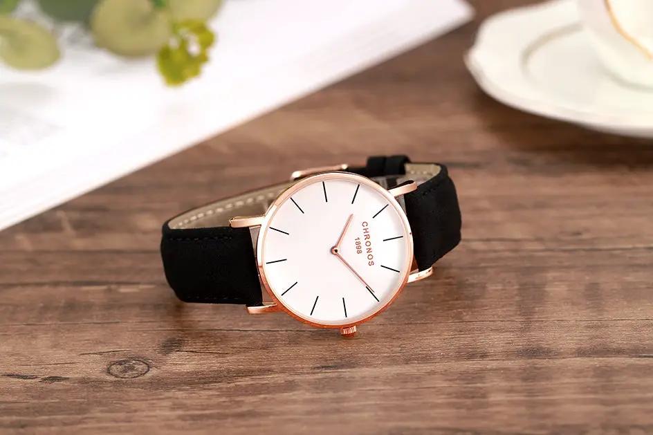 Chronos unisex luxury watch with rose-gold case, black strap and white minimalist dial
