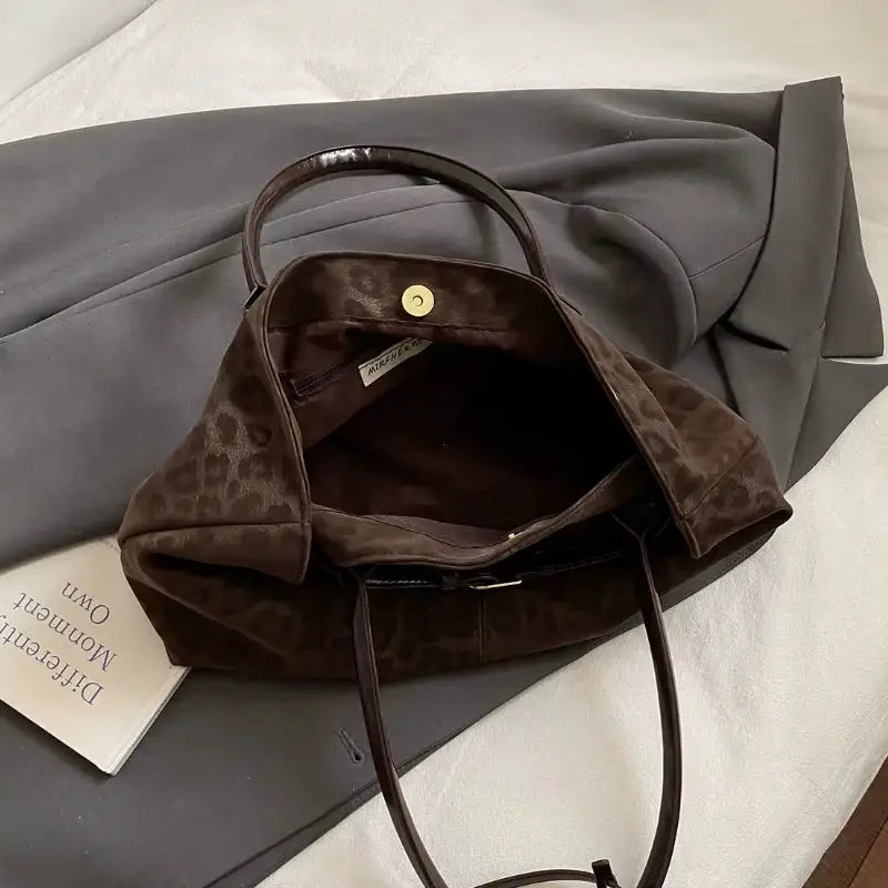 Leopard PU leather shoulder bag for women by Simples Market; brown leopard print, short handles, magnetic snap closure.