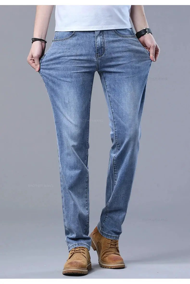 Men's light blue slim stretch denim jeans with classic pockets for casual wear